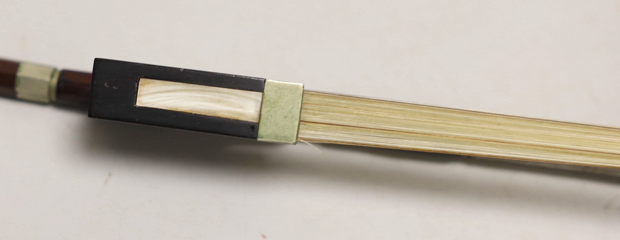 A French single back violin, interior label reads ‘Médio Fino’, back measures 35.5cm excl button. With case and bow